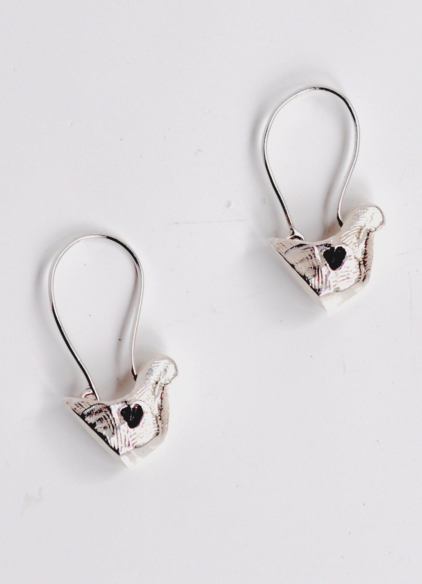 Graceful Bird Charm Earrings In Sterling Silver