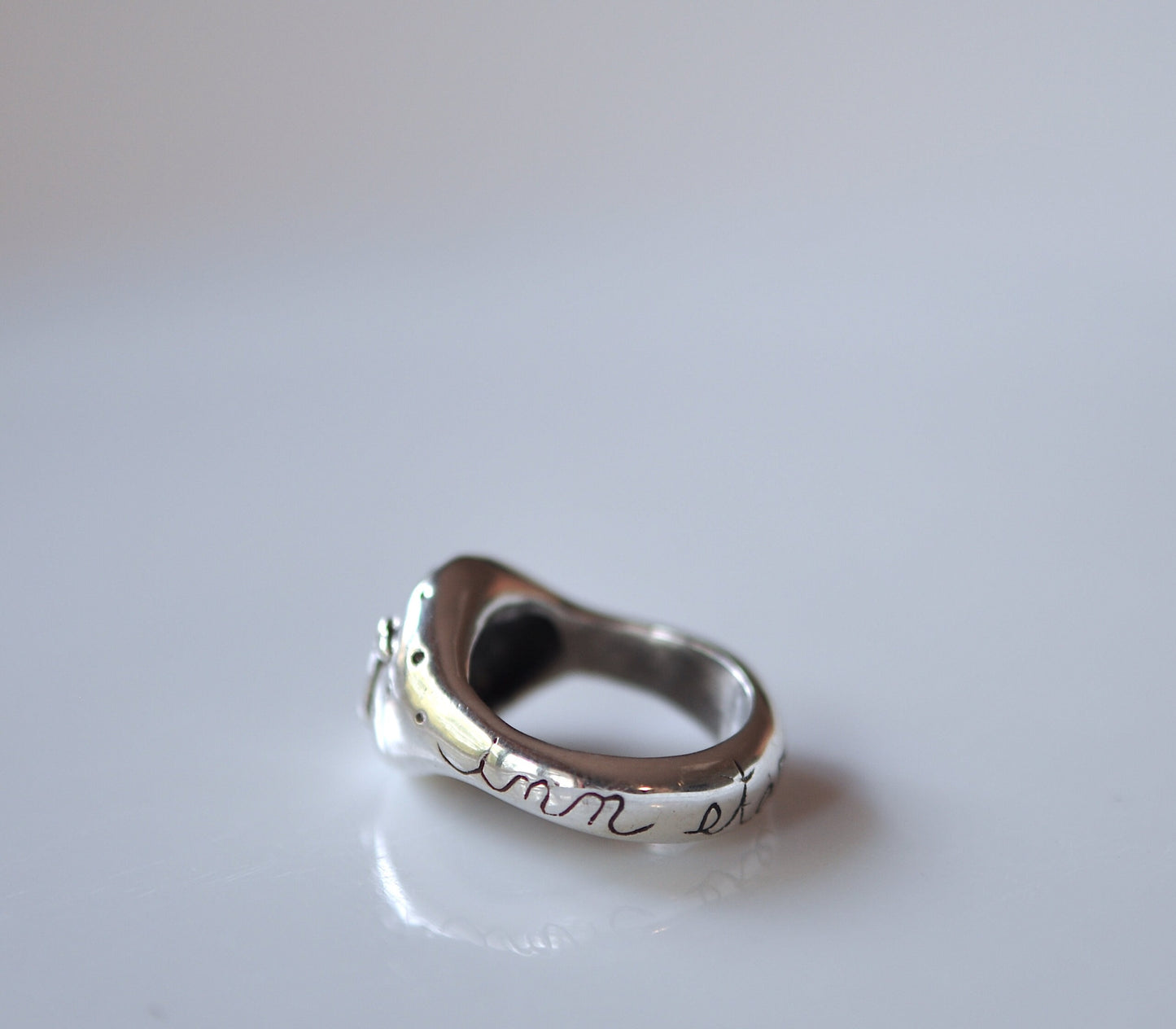 a close up of a ring on a table