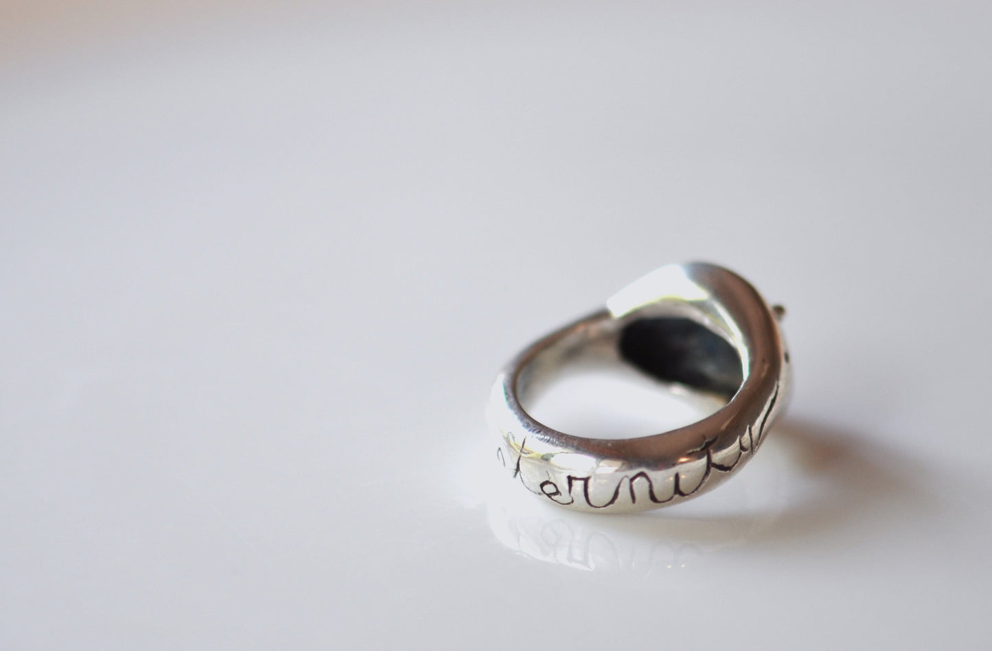 a close up of a ring on a table