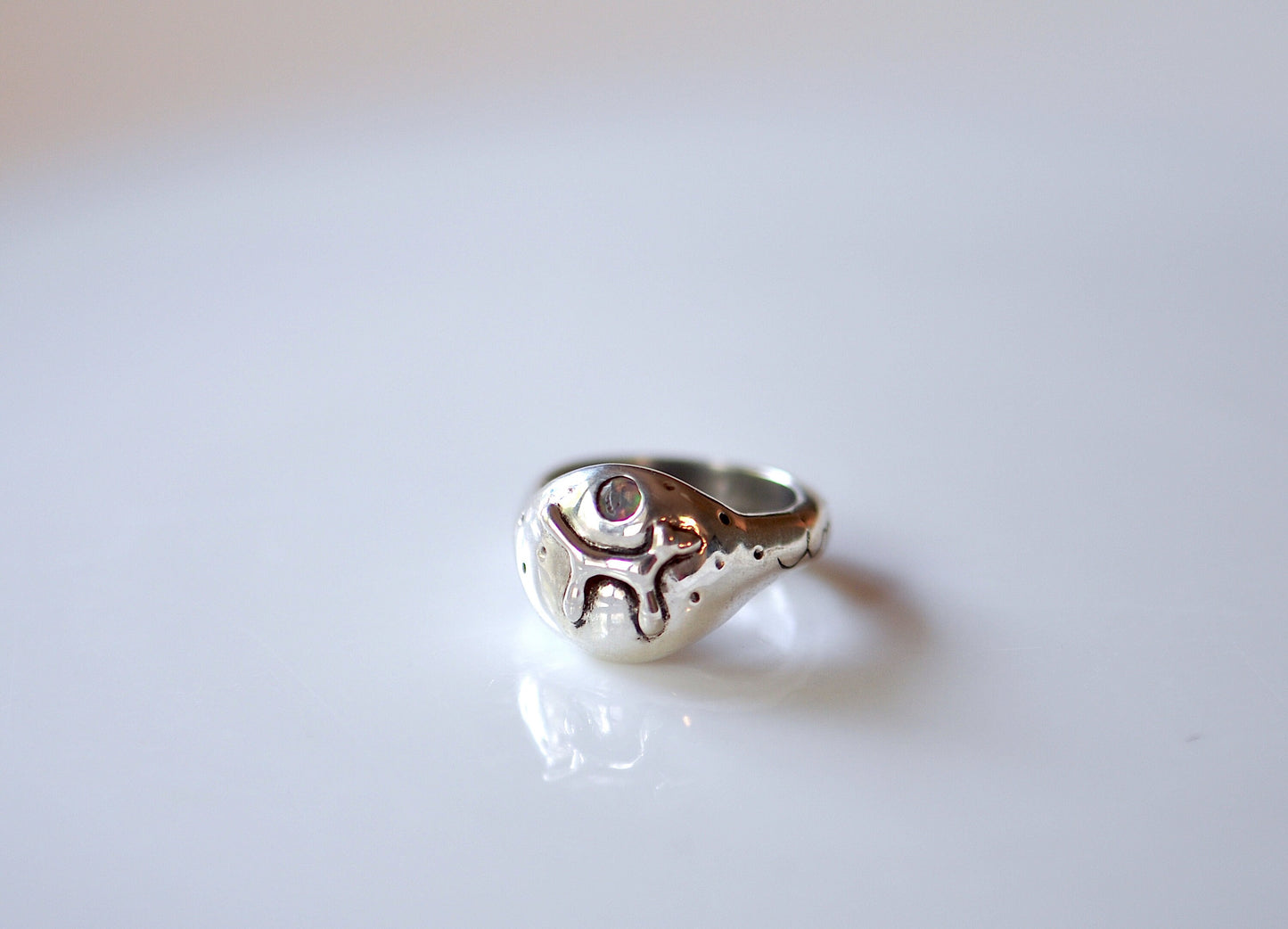 a close up of a ring on a table