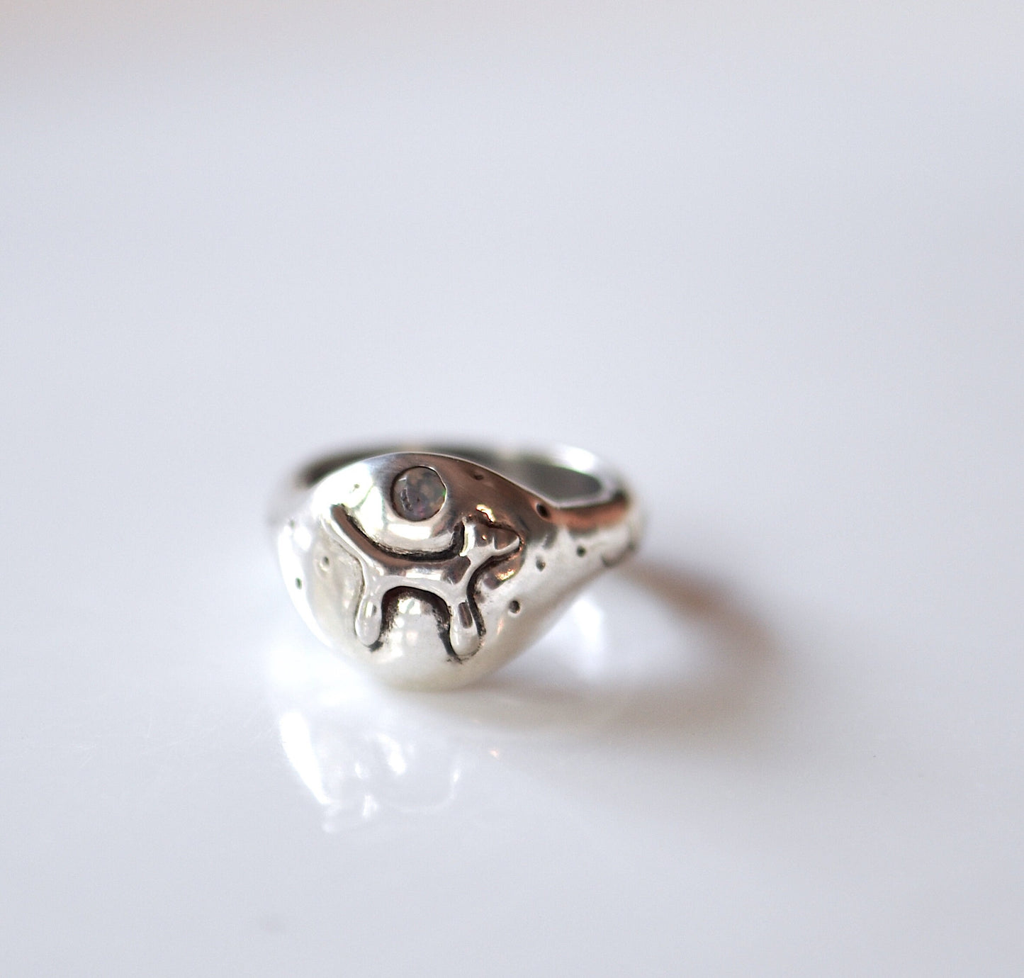 a close up of a ring on a table